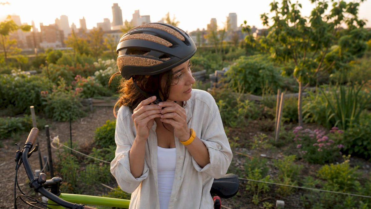 Cyclist wearing eco-friendly helmet outdoors in park