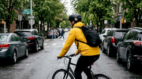 Urban cyclist wearing smart helmet on city street