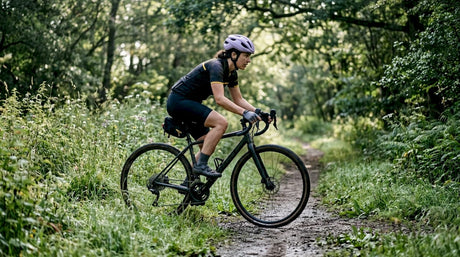 Cyclist demonstrating gravel ready position on trail