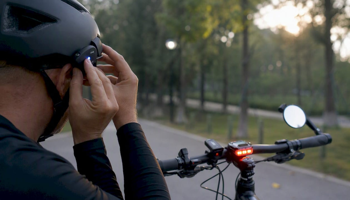 Cyclist adjusting connected safety gear on urban bike lane