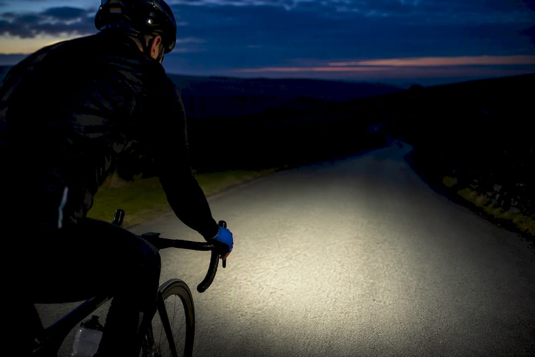 Cyclist riding within controlled road beam